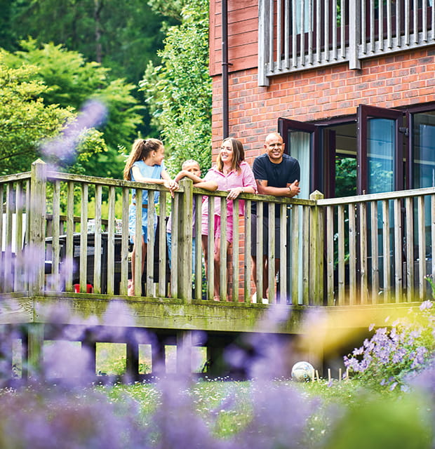 Family on the balcony at Whitemead Forest Park